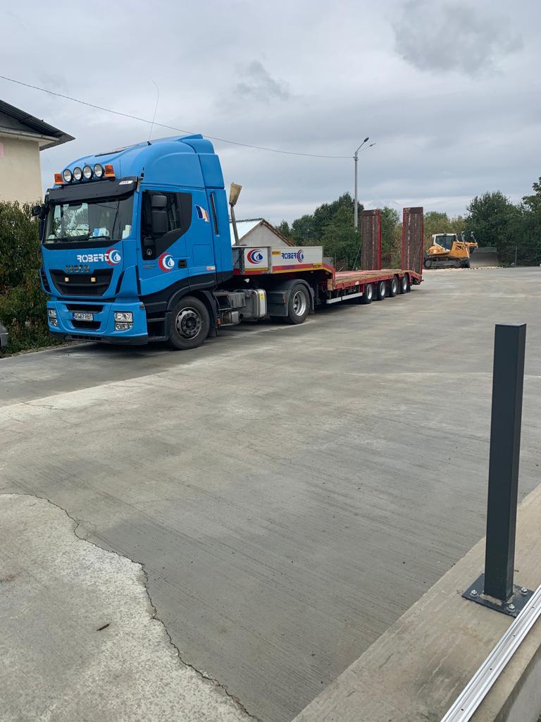 Descărcare agregate la hală industrială